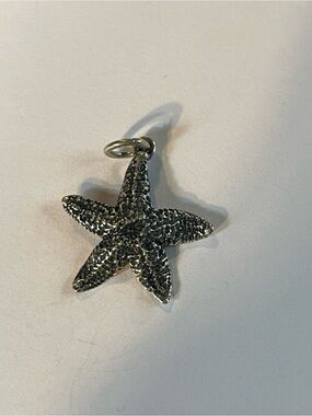 Retired collection James Avery starfish charm. Sterling.